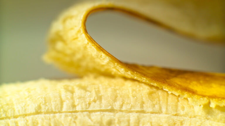 Close-up of a banana with its peel