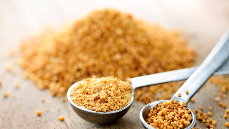 Coconut sugar in measurement spoons
